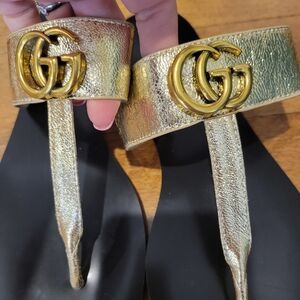 Gucci Gold Metallic Thong Sandals With Brass Logo
